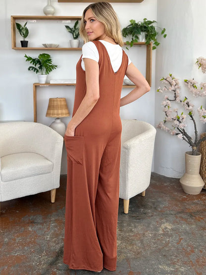 Plus size Trendsi Double Take sleeveless wide-leg jumpsuit with pockets, full length, stylish and comfortable for casual wear.