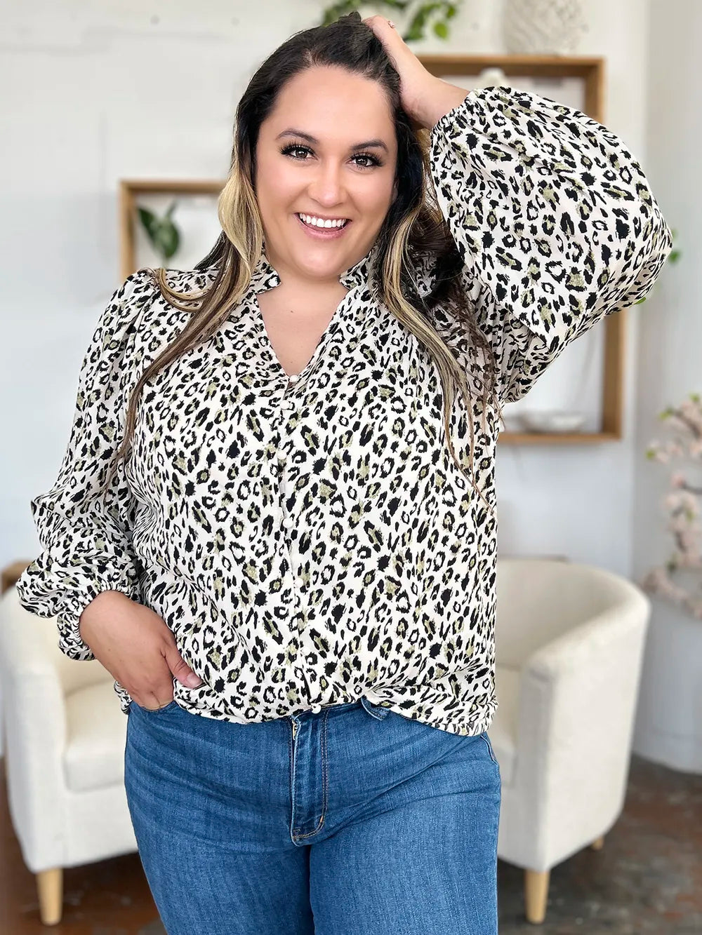 Plus size leopard print long sleeve blouse from Trendsi, featuring a stylish double take full size design with a relaxed fit.