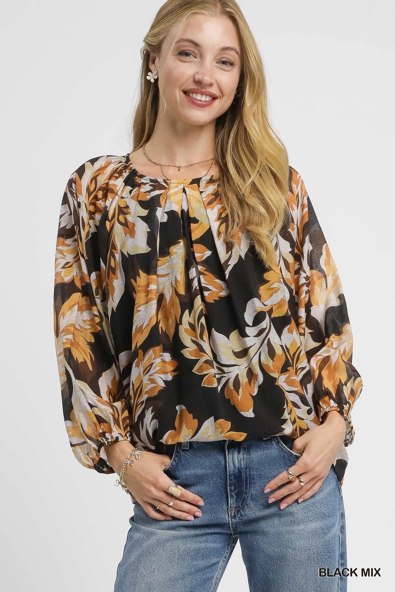 Black mix balloon sleeve blouse with autumn leaf print by Umgee, featuring stylish design and lightweight fabric.