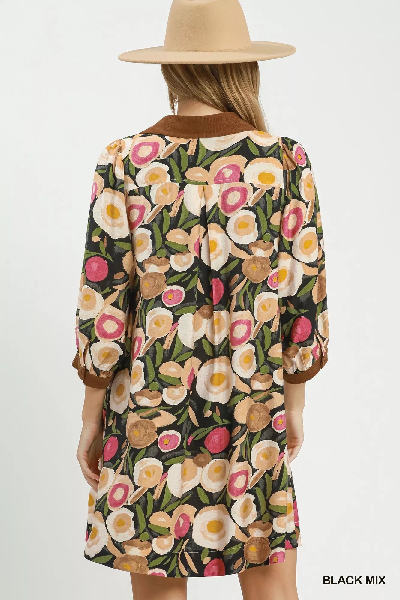 Black Umgee floral contrast trim shift mini dress with short sleeves and relaxed fit, perfect for casual or summer wear.