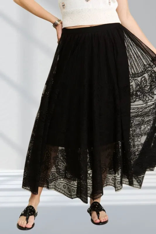 Black ADORA lace maxi skirt with elastic waist and raw hem, featuring a flowy, elegant design suitable for casual or dressy wear.