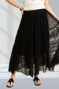 Black ADORA lace maxi skirt with elastic waist and raw hem, featuring a flowy, elegant design suitable for casual or dressy wear.