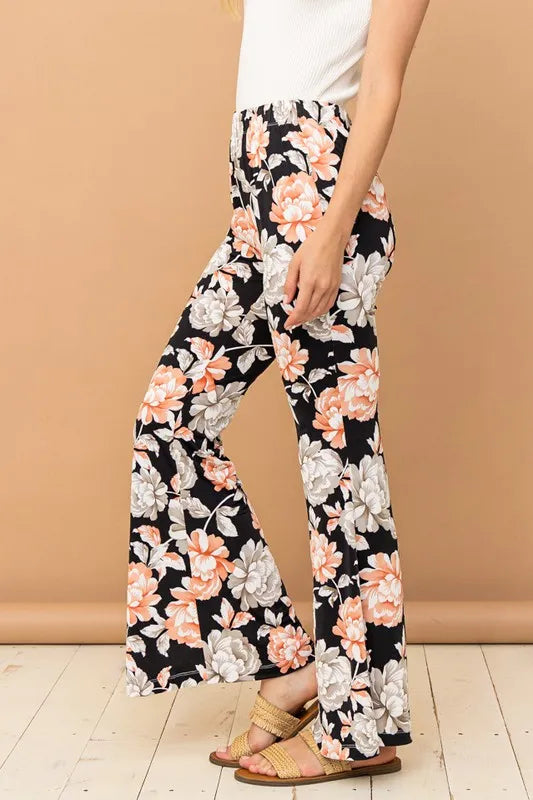 Black wrinkle-free stretch bell bottom flare pants by Trendsi, featuring a high waist and wide-leg design.