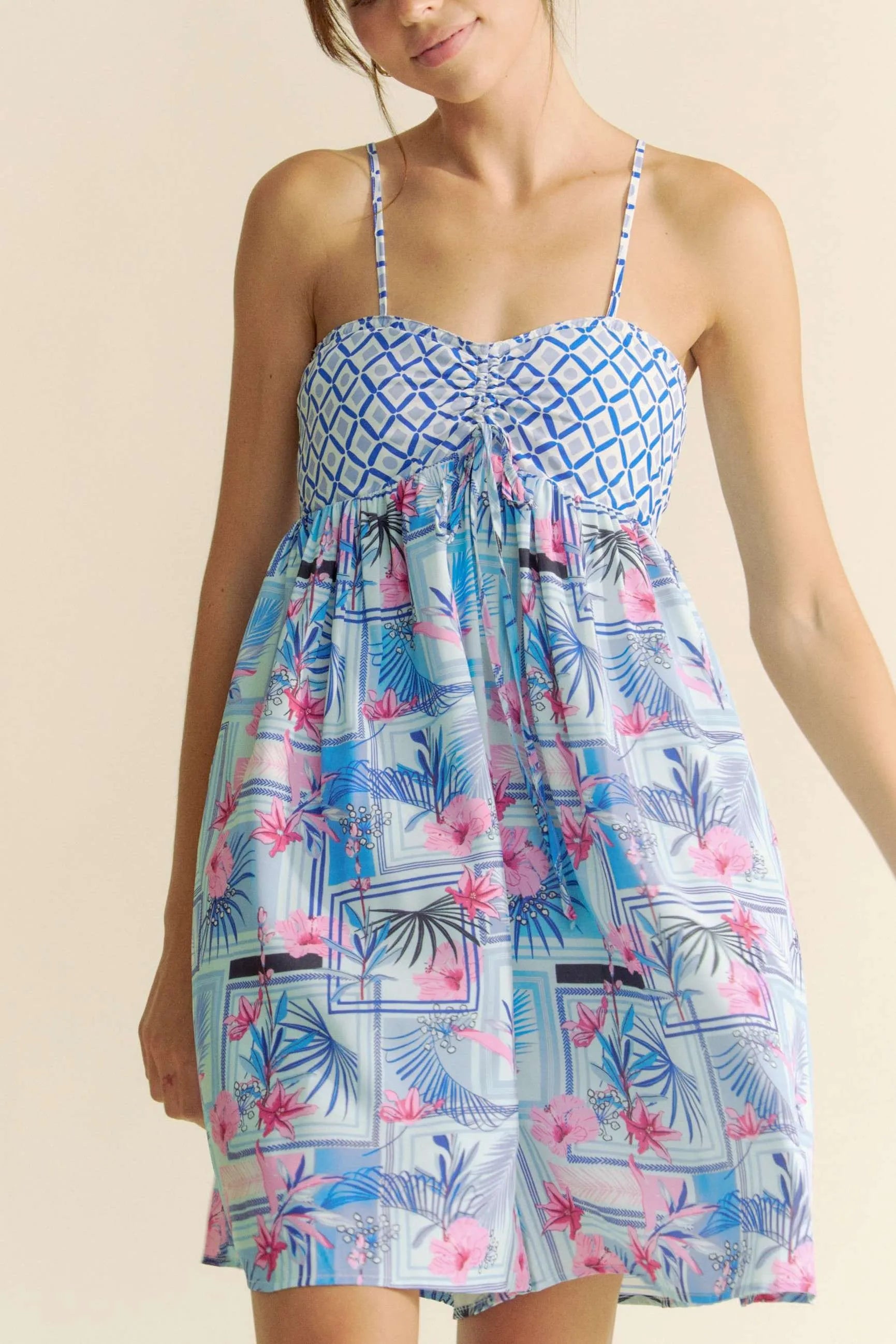 Blue and pink tropical floral geo print tie-back tube top romper by Davi & Dani, stylish and vibrant for warm weather.