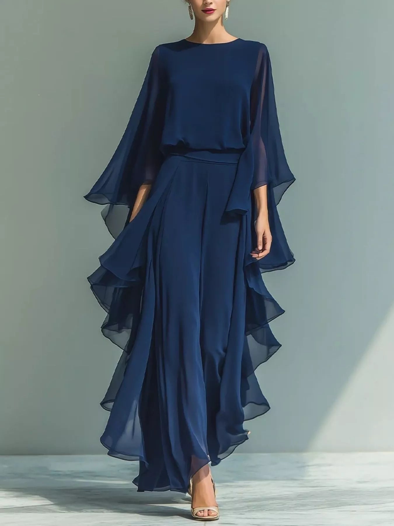 Blue ruffled chiffon long sleeve top and matching pants set by Trendsi, stylish and lightweight for elegant casual wear.