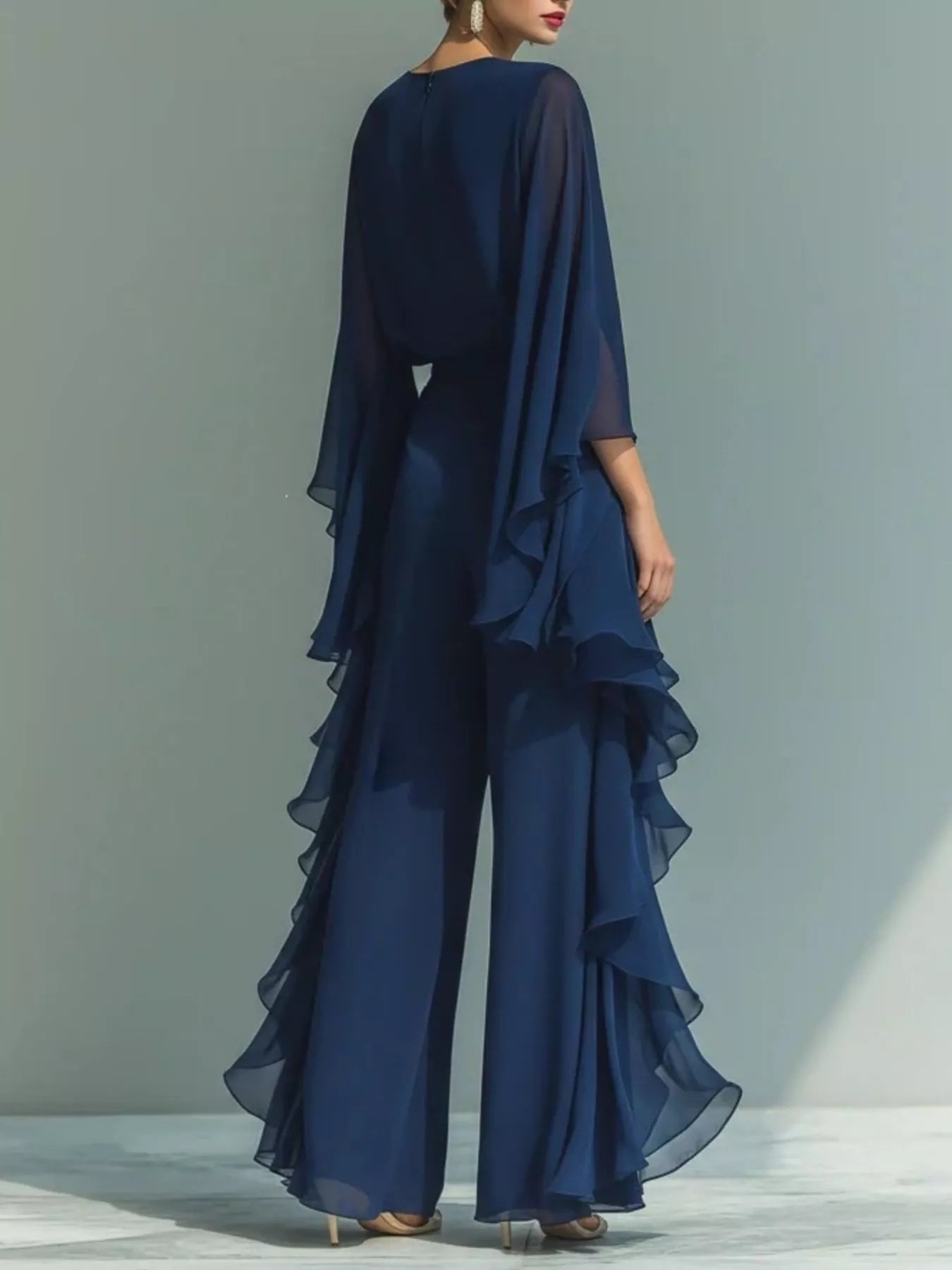 Blue ruffled chiffon long sleeve top and matching pants set by Trendsi, elegant and flowy for stylish daytime wear.