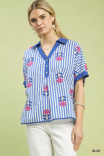 Blue Umgee stripe embroidered boho blouse with button-front closure, featuring colorful embroidery and relaxed fit.