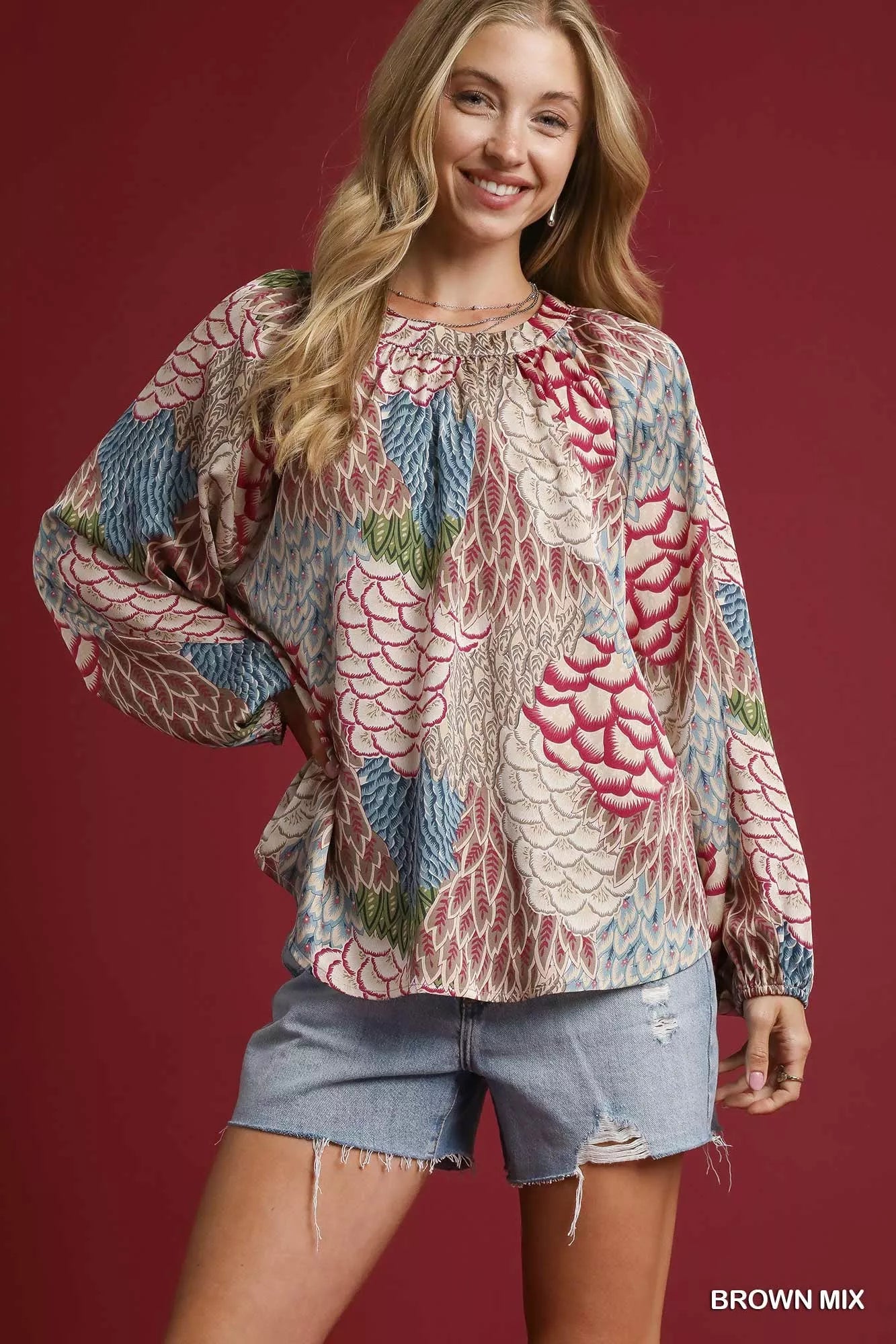 Brown mixed feather print peasant blouse by Umgee featuring boho style and relaxed fit.