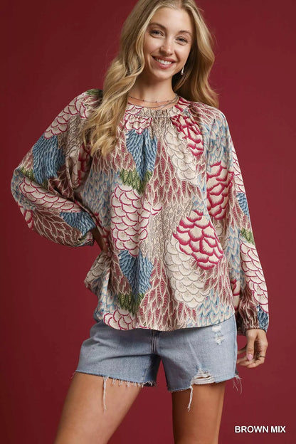 Brown mixed feather print peasant blouse by Umgee featuring boho style and relaxed fit.