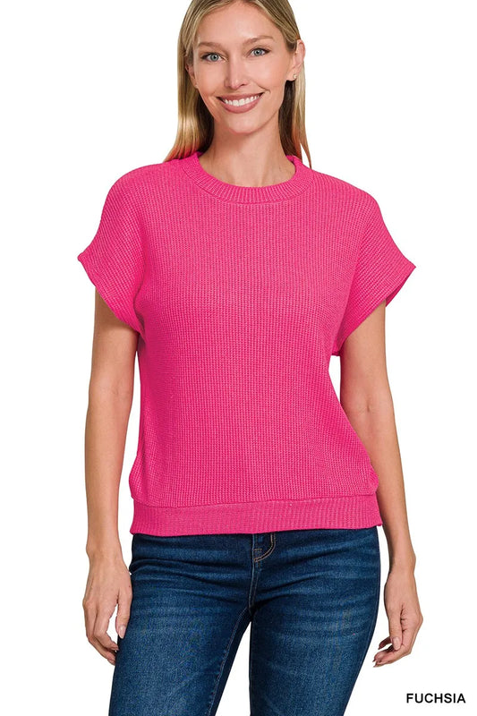 Trendsi Zenana short sleeve sweater with round neckline and banded bottom, in a cozy knit fabric, displayed flat.