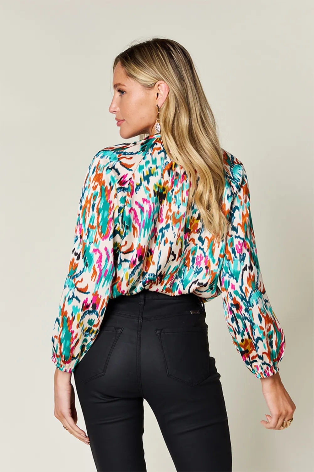 Plus size printed button-up long sleeve shirt from Trendsi, featuring a stylish double take full size design and classic fit.