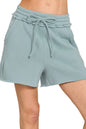 Zenana fleece raw hem shorts with drawstring, soft and comfortable, shown with casual styling.