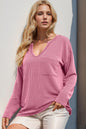 Striped long sleeve T-shirt with notched neckline from Trendsi, featuring a stylish double take design and comfortable fit.