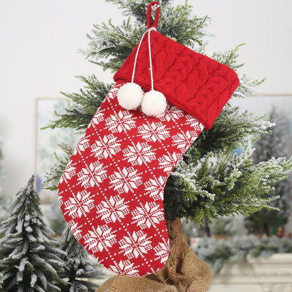 Christmas stocking hanging widget by Trendsi, decorative holiday stocking with festive design for Christmas decor.