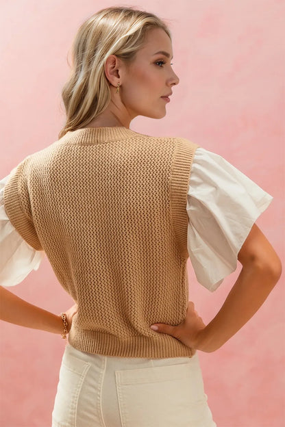 Full size ruffled round neck short sleeve sweater by Trendsi, featuring a cozy knit, ruffle details, and a classic fit in neutral color.