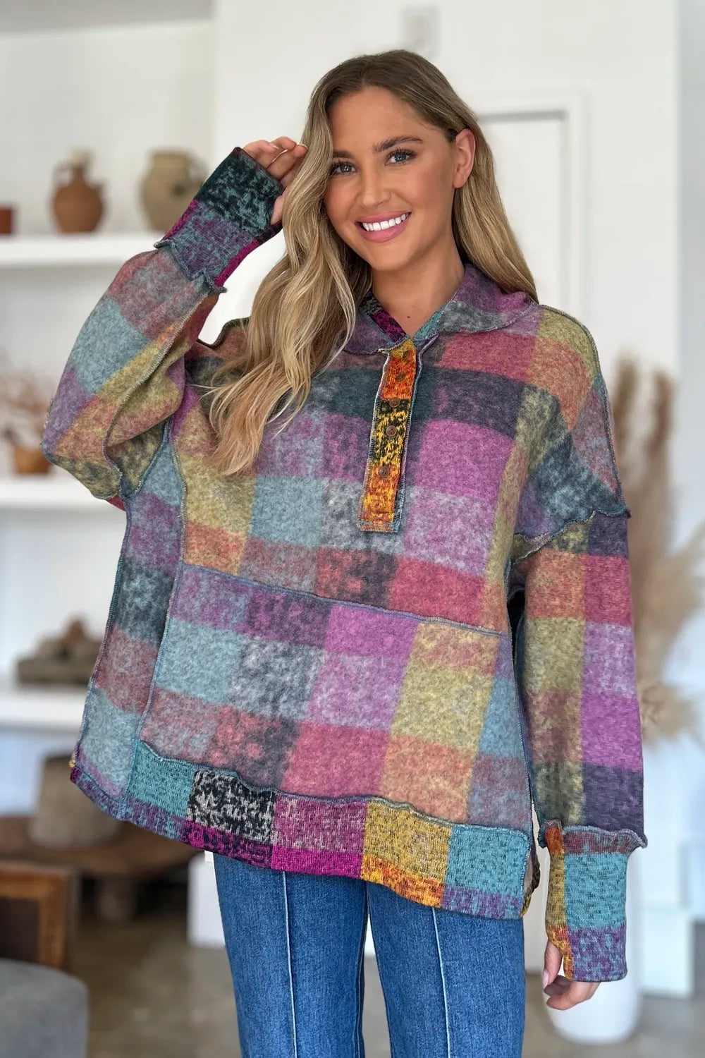 Plus size plaid fleece hoodie with dropped shoulders and full size fit, designed by Trendsi for a cozy, casual look.