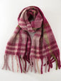 Polyester plaid scarf with fringe details from Trendsi, featuring a cozy, stylish design in classic checkered pattern.