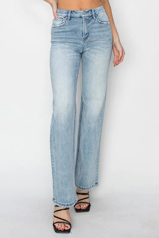 Plus size RISEN high rise straight jeans from Trendsi, showcasing dark denim fabric and classic five-pocket design.
