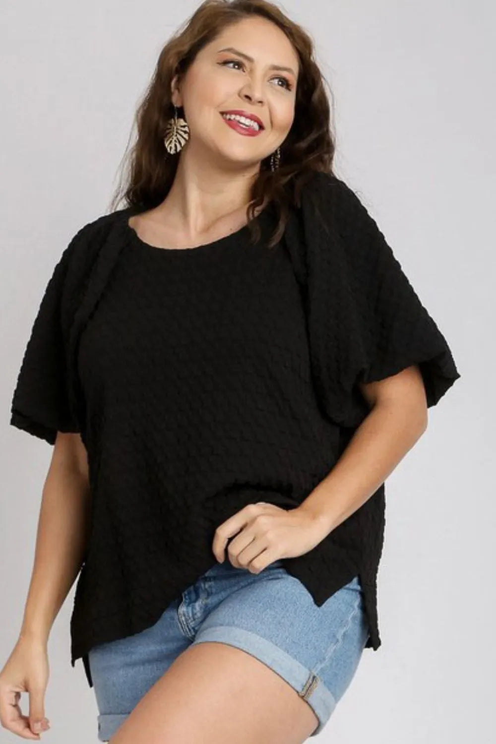 Plus size Umgee boxy jacquard top with round neck and side slit, featuring a full-size, stylish and comfortable design.