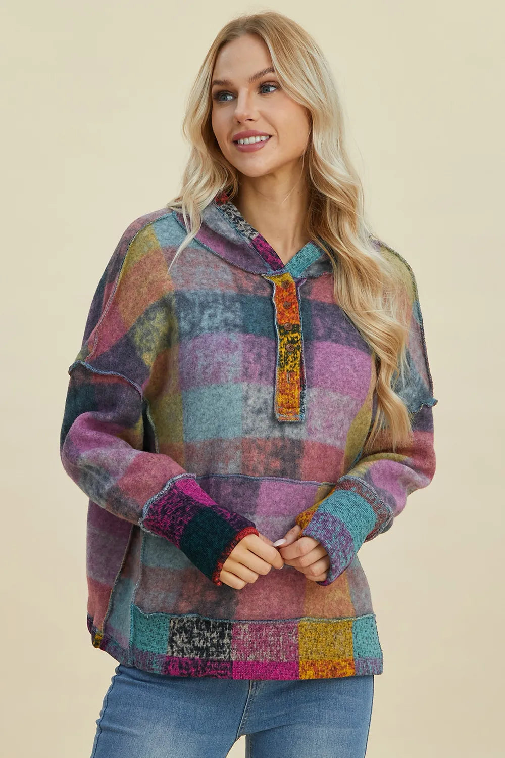 Plus size plaid fleece hoodie with dropped shoulders and a relaxed fit, from Trendsi, featuring a cozy, casual style.