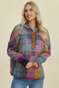 Plus size plaid fleece hoodie with dropped shoulders and a relaxed fit, from Trendsi, featuring a cozy, casual style.