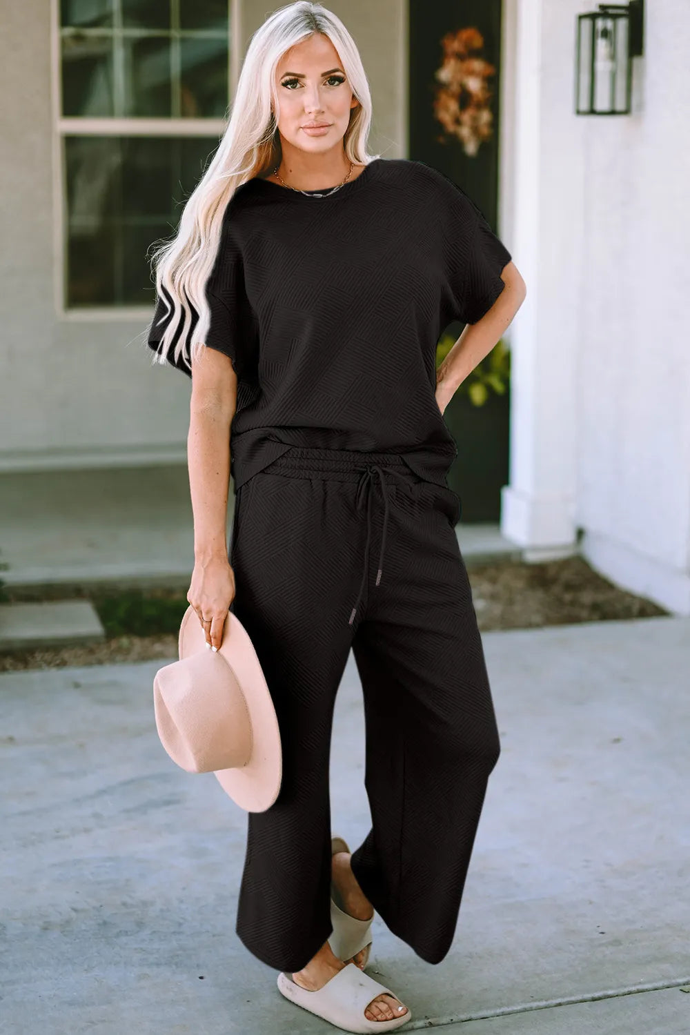 Trendsi Double Take full size textured short sleeve top and matching pants set, stylish and comfortable outfit for casual wear