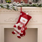 Decorative Christmas stocking hanging widget by Trendsi, featuring festive design with a loop for easy hanging on Christmas decor.