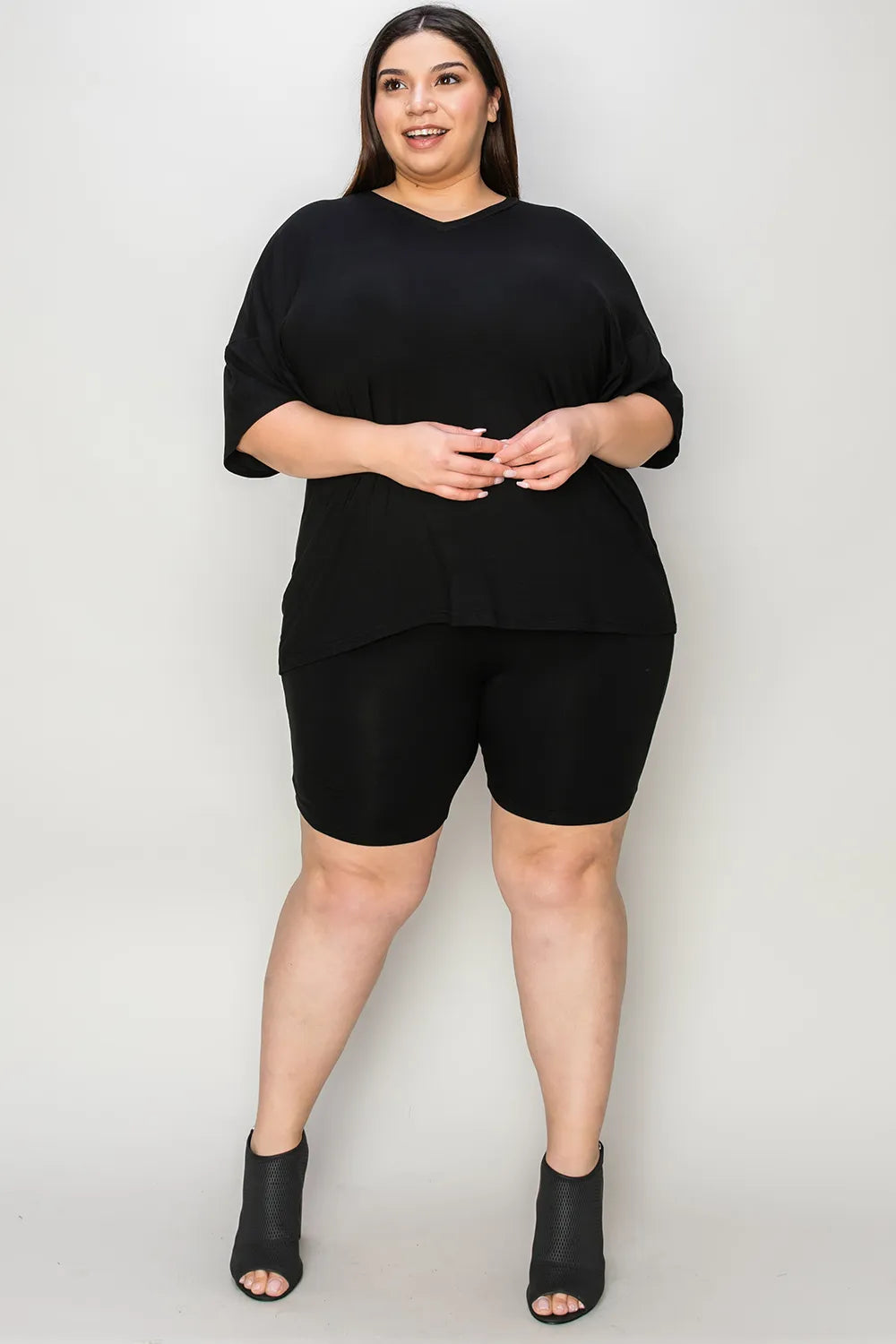 Basic Bae bamboo full-size V-neck drop shoulder T-shirt and shorts set by Trendsi, featuring a comfortable, casual fit in natural bamboo fabric.