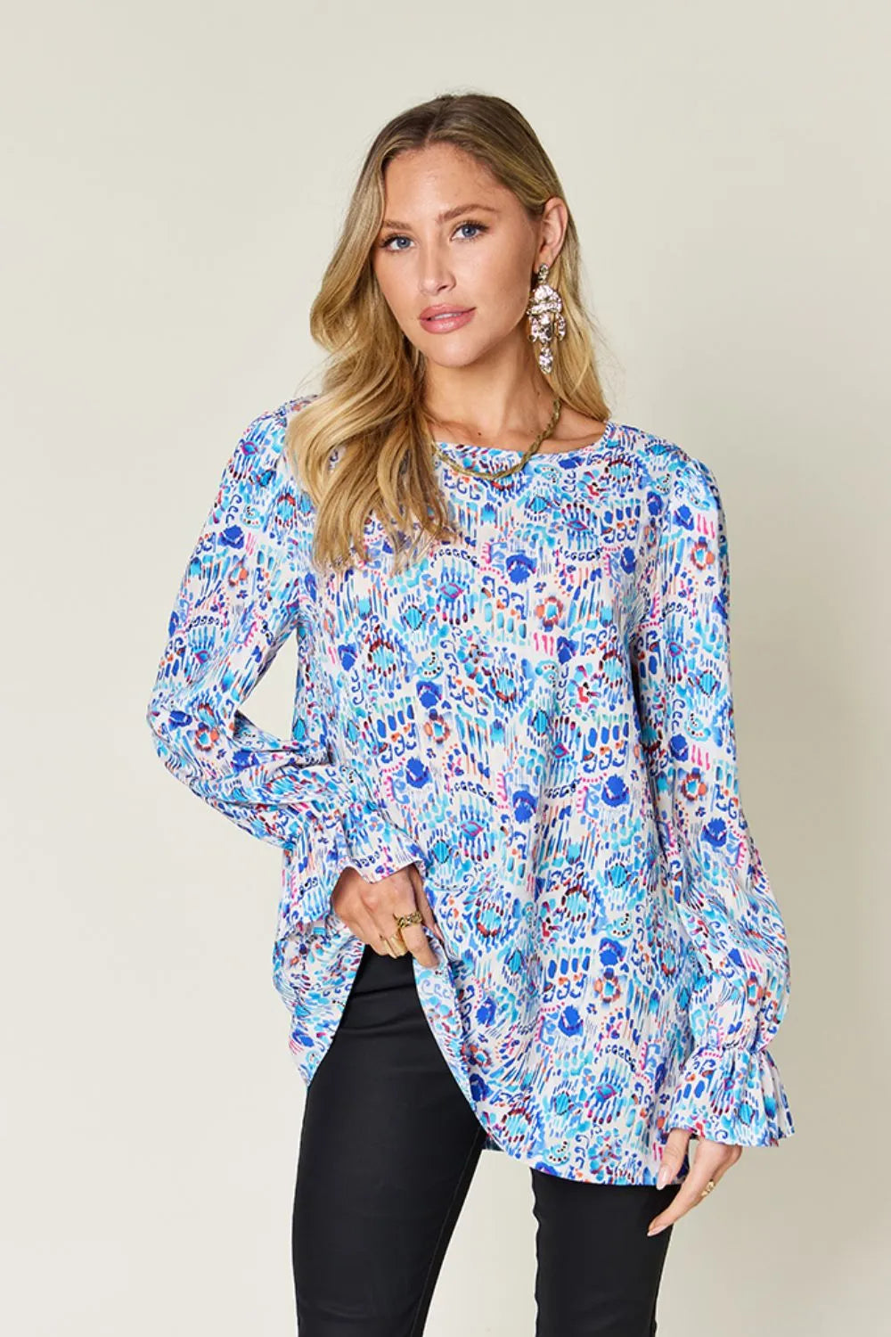 Printed flounce sleeve blouse from Trendsi, featuring a double take design and full size fit with stylish ruffle details.
