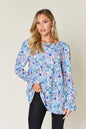 Printed flounce sleeve blouse from Trendsi, featuring a double take design and full size fit with stylish ruffle details.