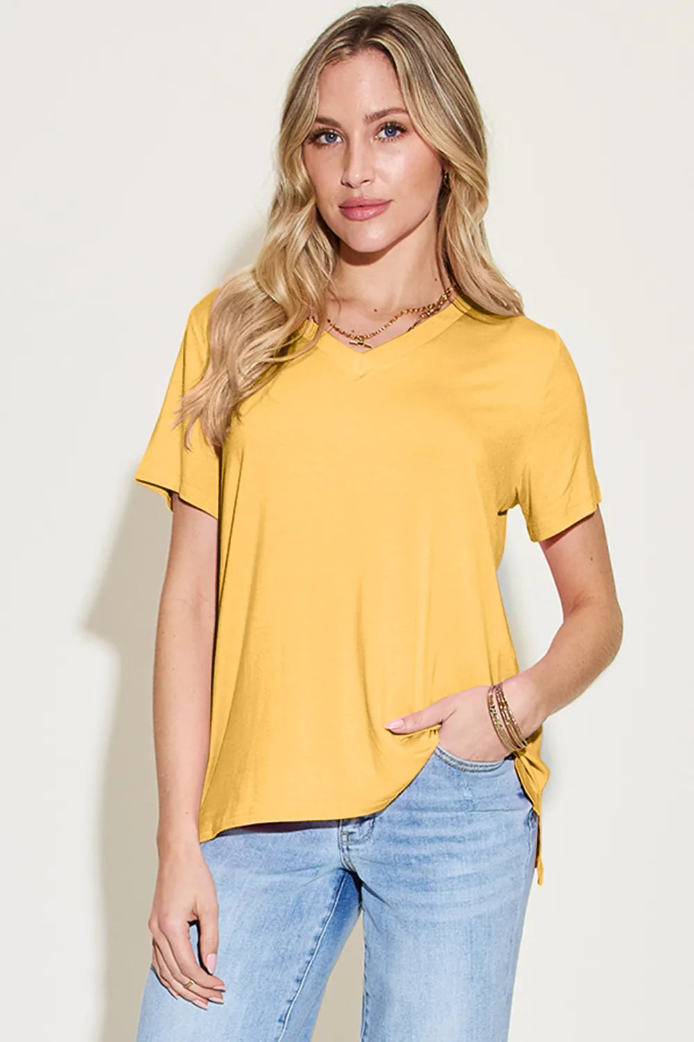 Basic Bae Bamboo V-Neck High-Low T-Shirt by Trendsi, showing the full front view with V-neck and high-low hem in soft bamboo fabric.