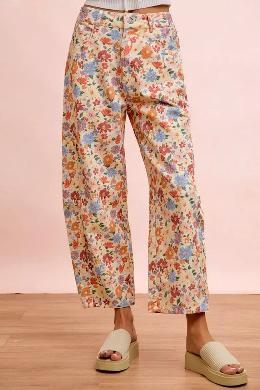 BiBi Washed floral printed twill barrel pants by Trendsi, featuring a relaxed fit with colorful floral patterns and casual style.