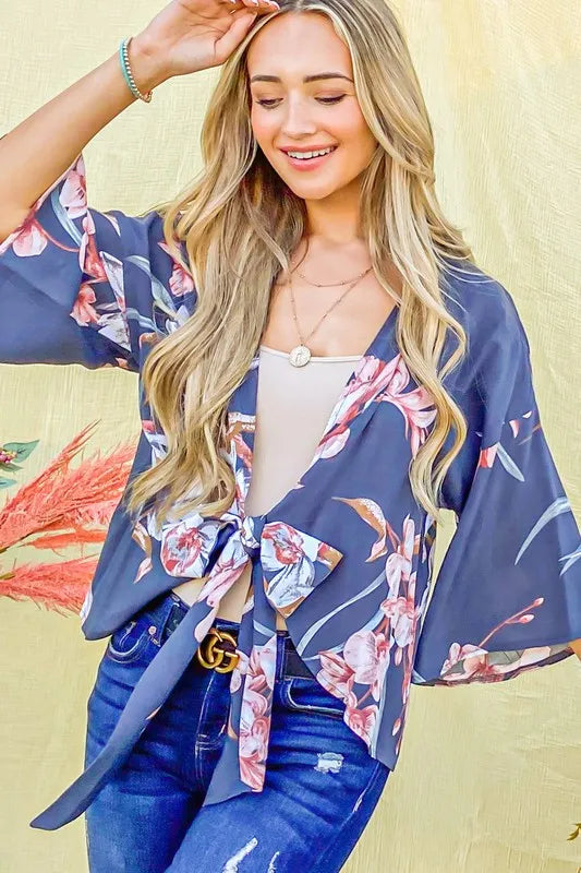 Charcoal floral print top from Trendsi with front tie knot, long sleeves, and V-neck design.