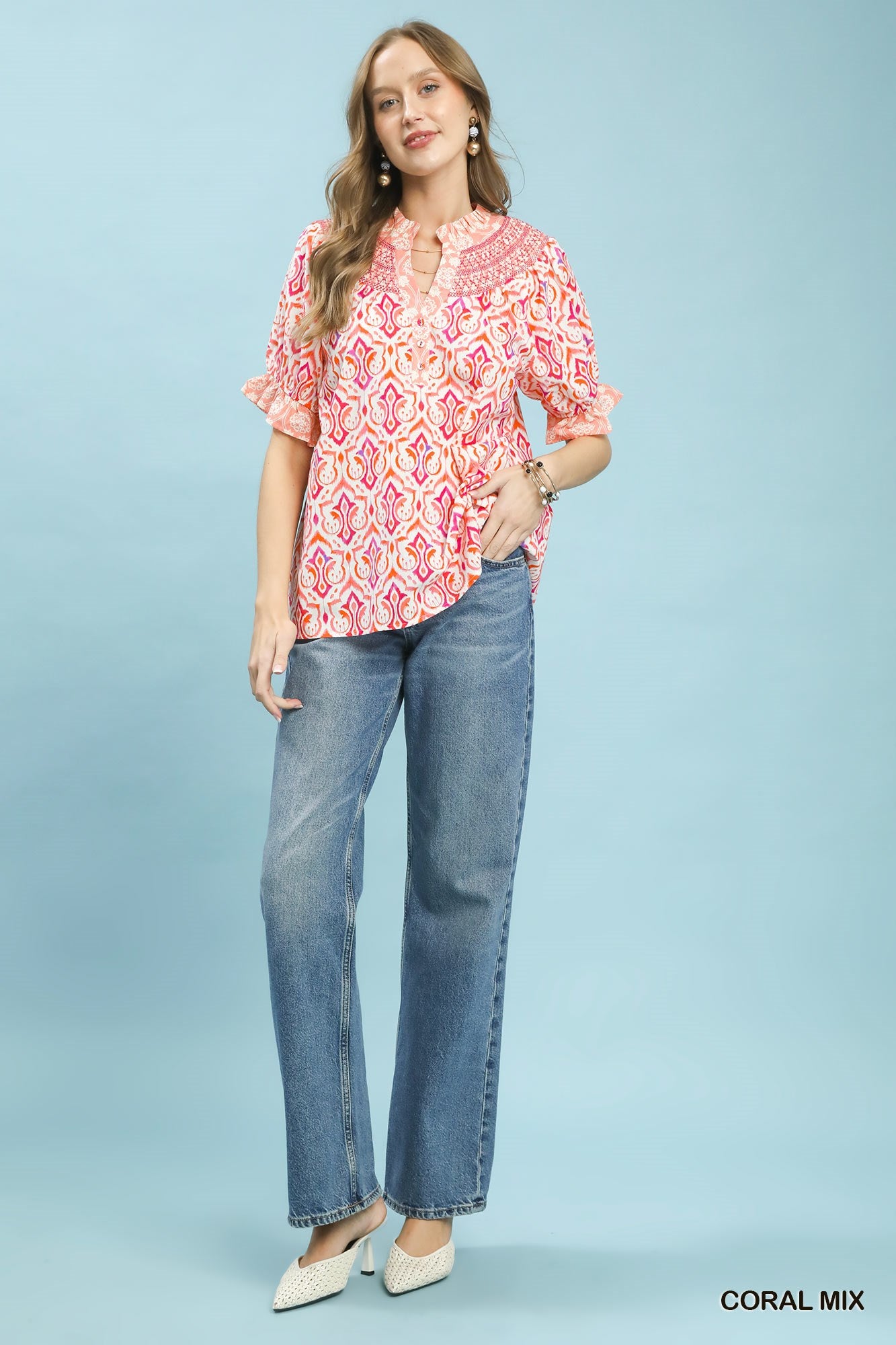 Coral mixed boho puff sleeve smocked top by Umgee, featuring a relaxed fit and stylish ruffle details.