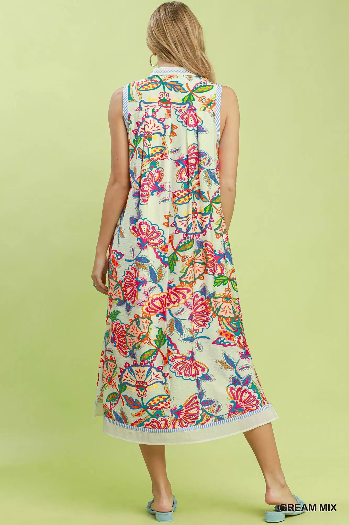 Cream paisley floral sleeveless midi dress by Umgee, featuring a flowy silhouette and intricate floral pattern.