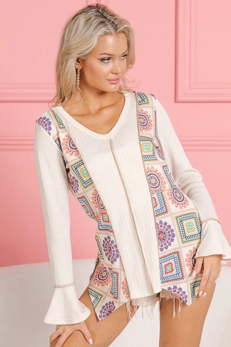 Cream V-neck top with granny square print and contrast details, featuring a ribbed fabric from Trendsi's BiBi collection.