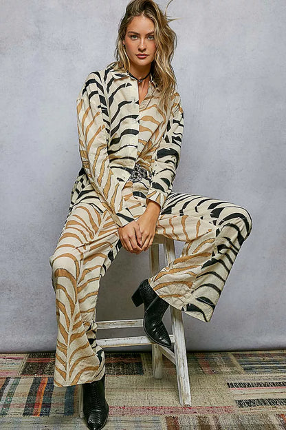 Cream and zebra print woven long sleeve shirt with spangle details, two-tone design, by Trendsi.