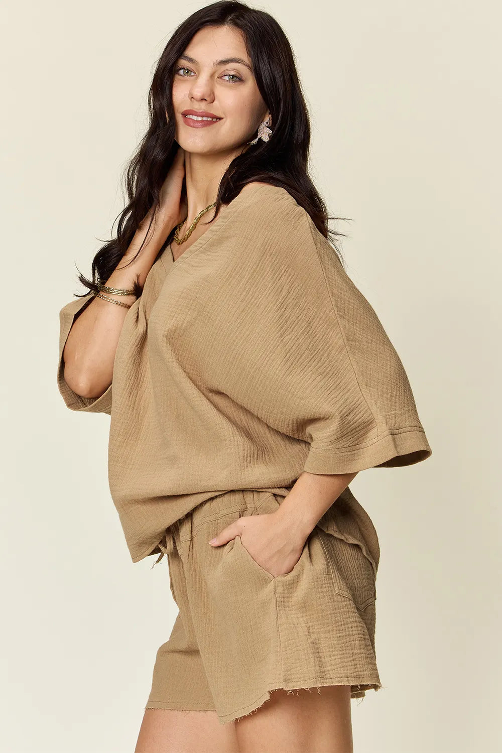 Trendsi Double Take Texture half sleeve T-shirt and drawstring shorts set, casual and stylish for everyday wear.