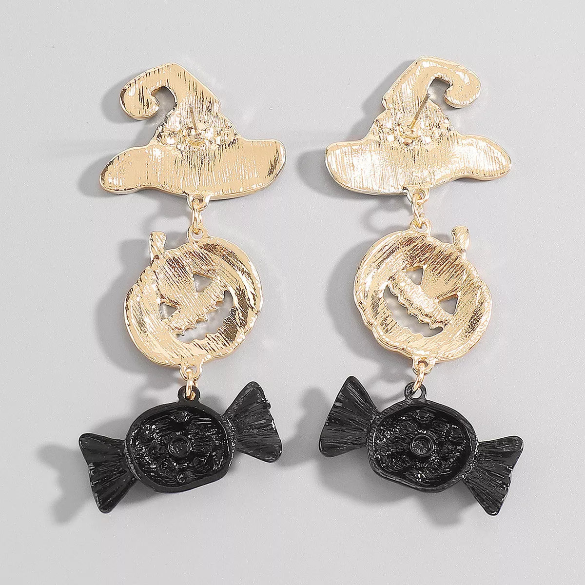 18K gold-plated alloy pumpkin earrings for Halloween, featuring festive orange and gold tones with intricate pumpkin design.