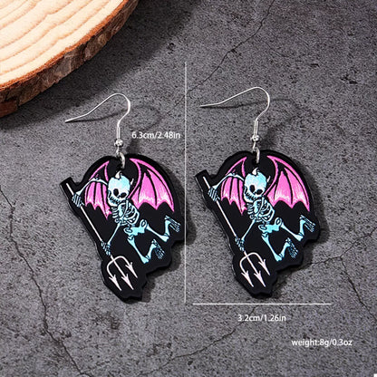 Spooky skeleton devil wing dangle earrings in black with red accents, featuring detailed skeletal and wing designs for Halloween.
