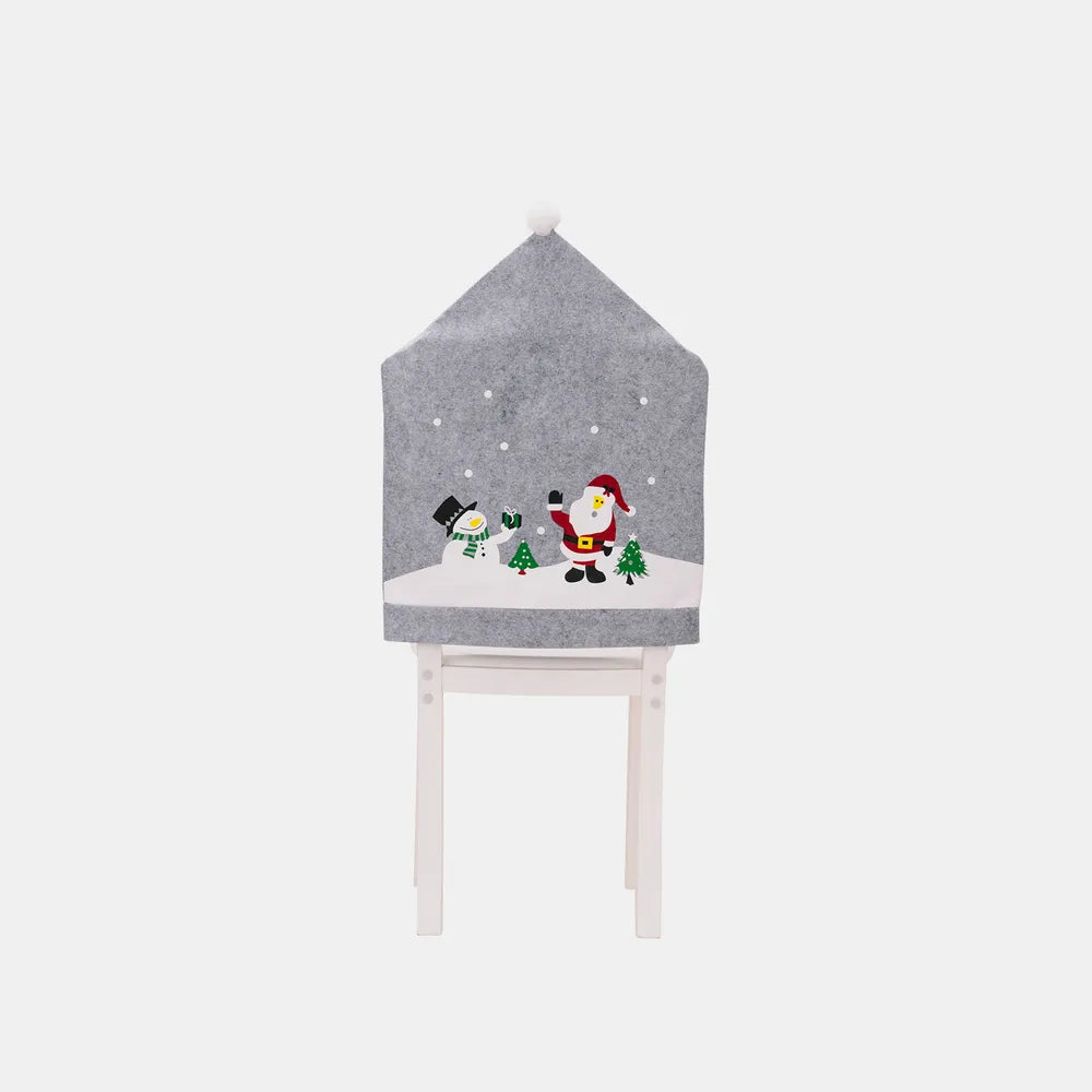 Christmas pattern chair cover from Trendsi featuring festive red and green holiday motifs on a fabric chair cover.