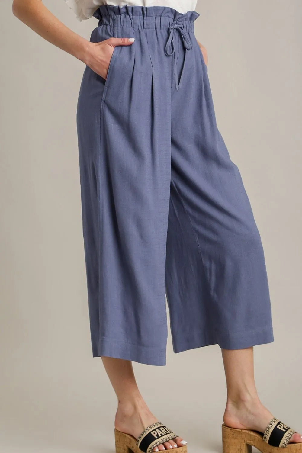 Plus size linen wide fit pants with drawstring from Umgee, featuring relaxed, full-size design and comfortable waistband.