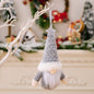Assorted 2-piece faceless gnome hanging widgets with colorful hats and beards, perfect for garden or home decor.