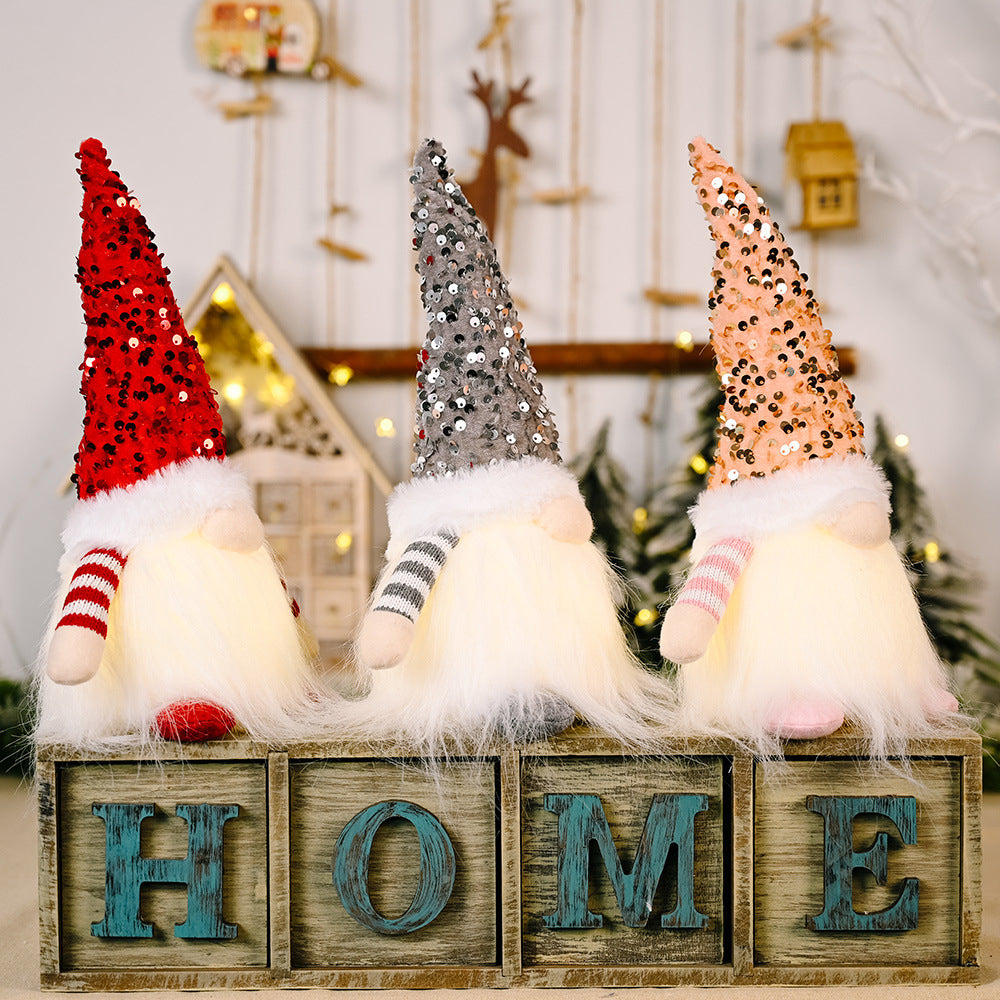 Sequin light-up faceless gnome toy with glowing lights and shiny sequins, perfect for festive home decor.
