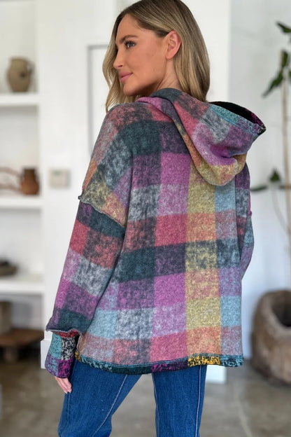 Plus size fleece hoodie by Trendsi featuring a double take plaid pattern, dropped shoulders, and a full-size, cozy fit.