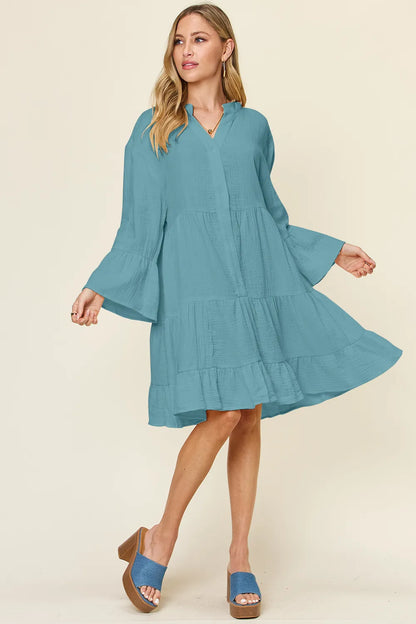 Plus size Double Take texture button-up dress with ruffle hem, featuring a full size fit and stylish design by Trendsi.