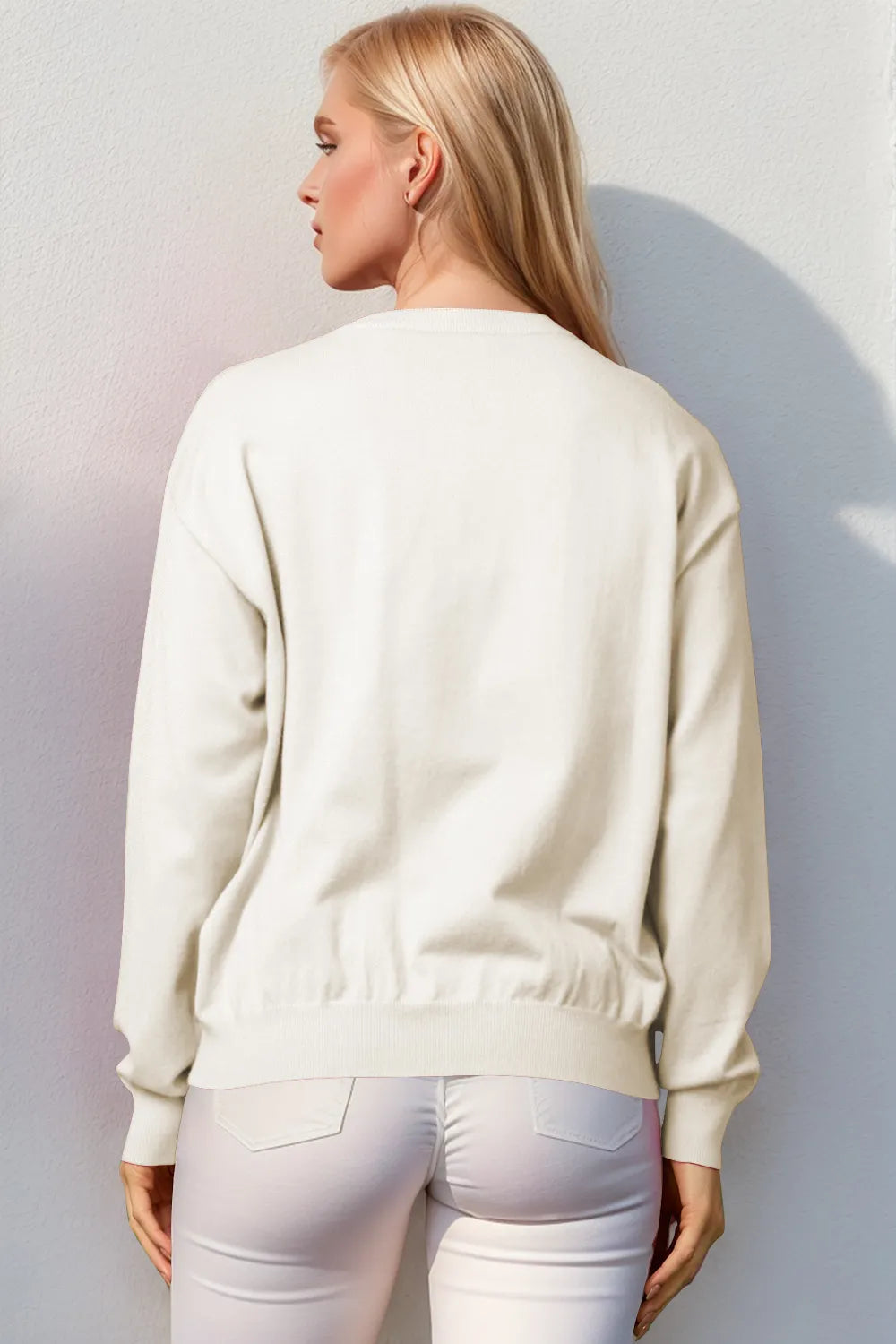 Trendsi Double Take full-size nutcracker sequin long sleeve sweater featuring festive holiday design and shimmering embellishments.