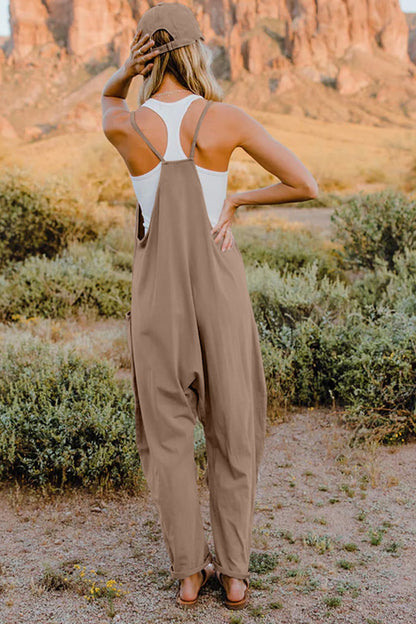 Trendsi Double Take full size sleeveless V-neck jumpsuit with pockets, showcasing the stylish, comfortable design and fabric details.