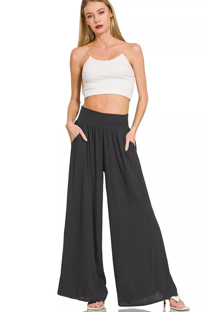 Zenana wide-leg lounge pants with smocked waistband, featuring a comfortable relaxed fit and soft fabric for casual wear.