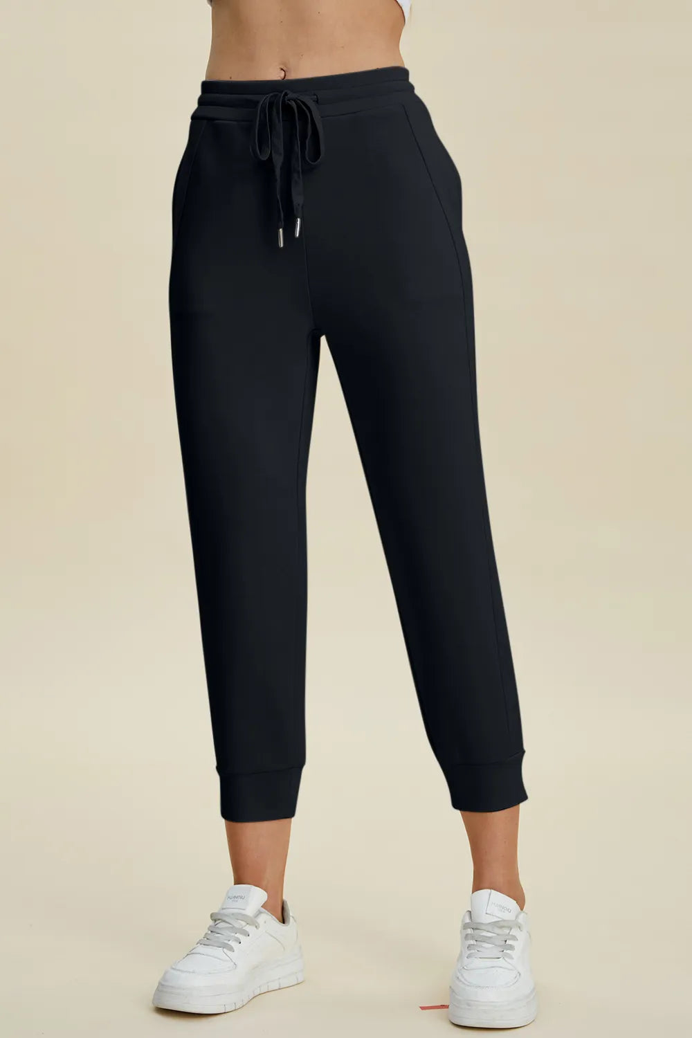 Trendsi Basic Bae full-size air scuba drawstring high-waist cropped pants in black fabric, featuring a relaxed fit and wide leg design.